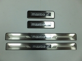 JMT Накладки на дверные пороги с логотипом и LED подсветкой, нерж. MAZDA (мазда) 2 07-
